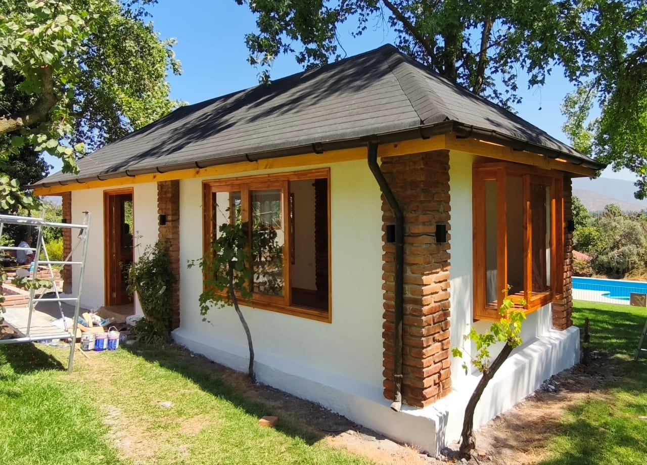 Quincho rústico con parrilla y horno de barro - Construmel